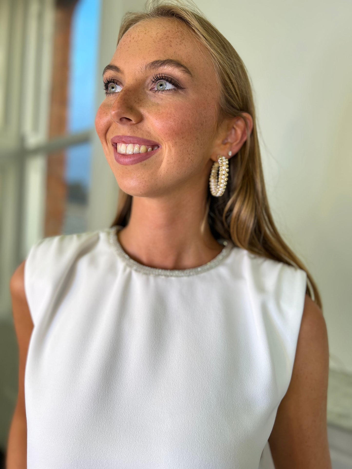 Louxor Cream Sleeveless Top with Silver Chain Detail on the Neck