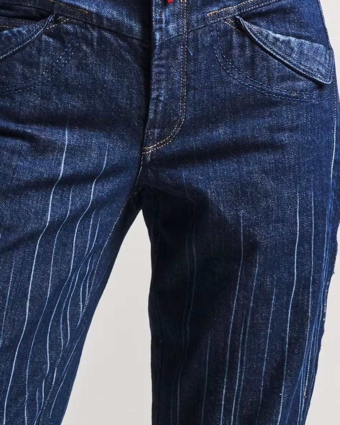 Fade-in-out laser pinstripe jeans