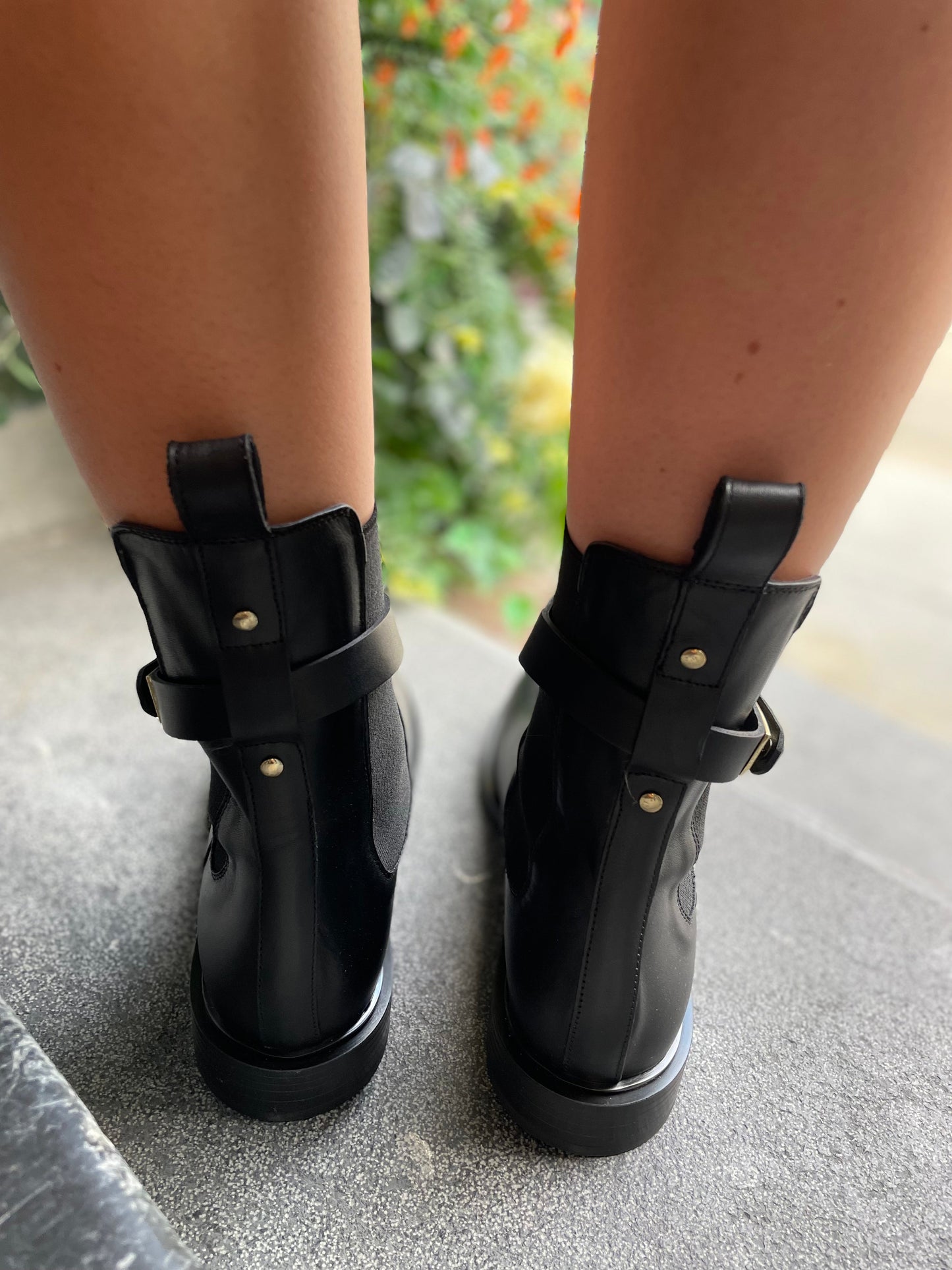 Black Leather Boots with Gold Clasp Detail