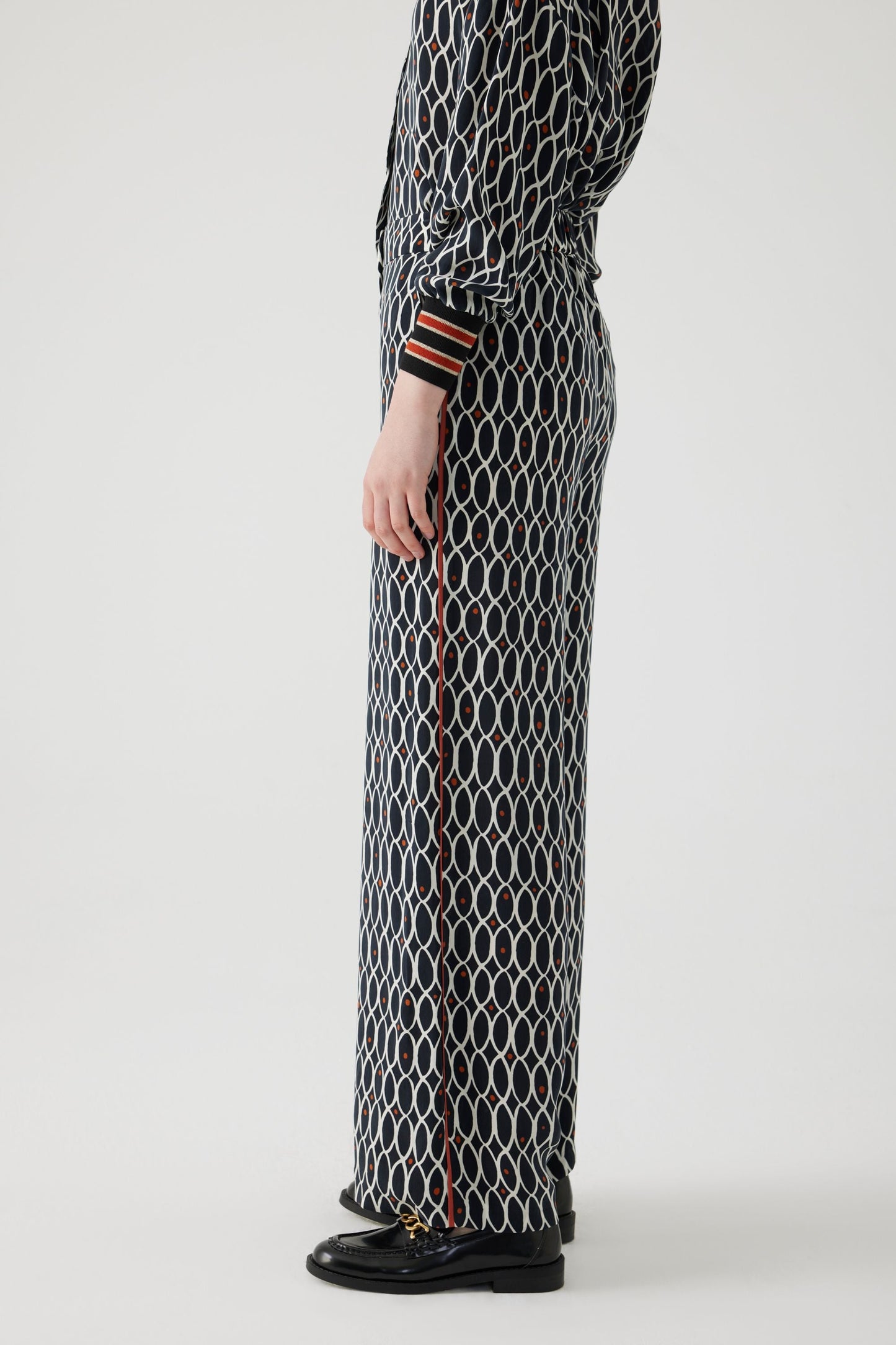 Adia Black and White Print Trousers with a Rust Trim